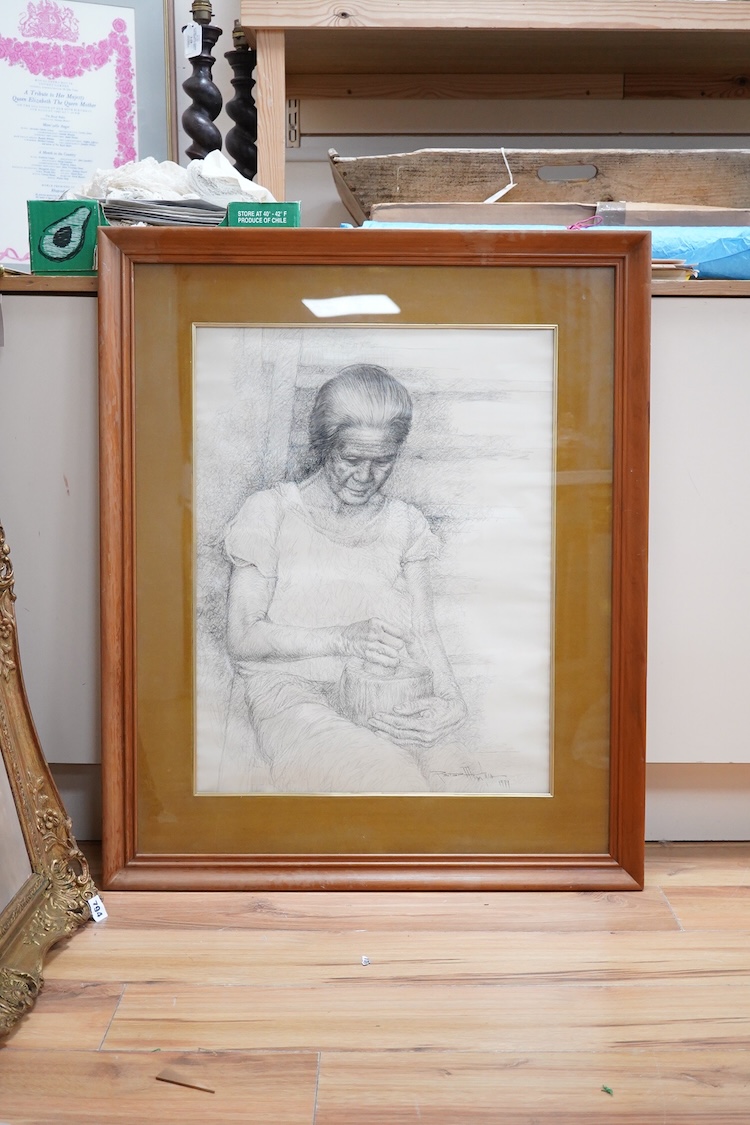 Far Eastern School, 20th century, Woman seated grinding spices with a pestle and mortar, signed and dated 1979, pencil sketch, 64 x 48cm